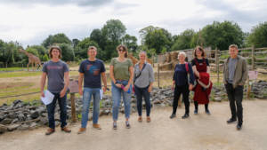 Some of the Carterwood team having a photo opportunity with a giraffe!